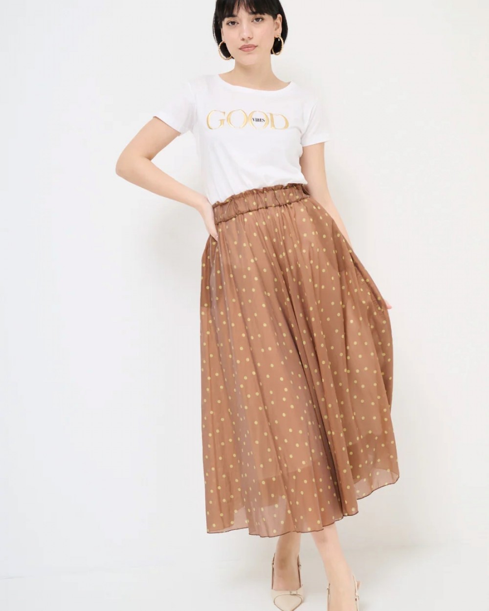 Fusta vaporoasa cu buline si buzunare